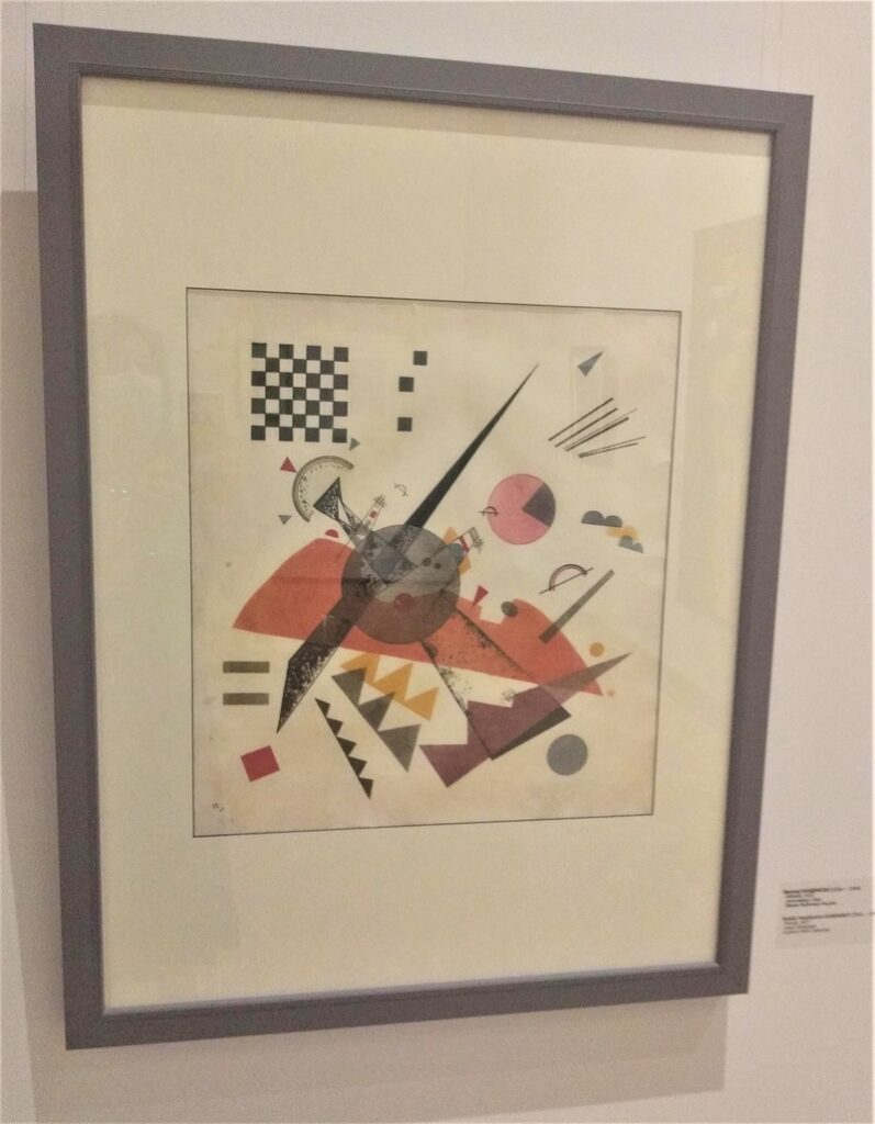 Kandinski , apstraktna kompozicija sa trouglima , sivim krugom i većim poljem u oranž boji